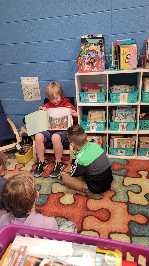 students listening to a read to me book