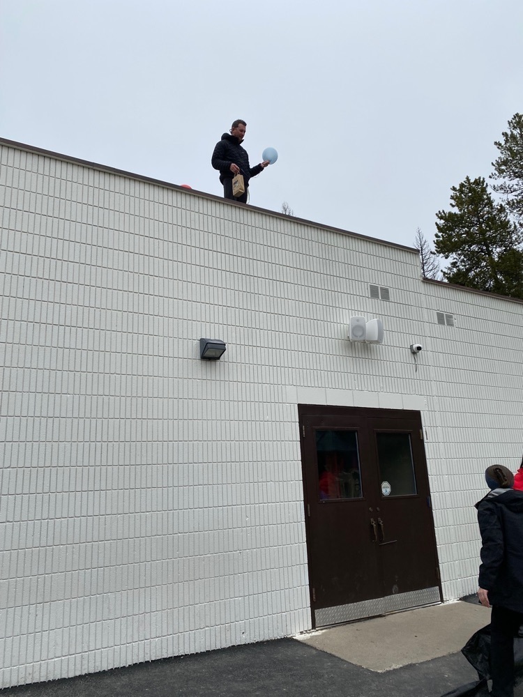 principal on roof dropping eggs